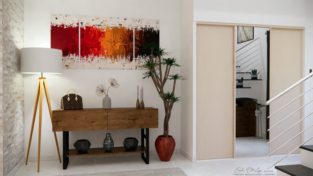 Juste à côté du placard de l'entrée, on aménagera l'espace avec une console en bois de chêne, embellie par quelques objets de décoration soigneusement choisis. De part et d'autre de ce meuble, une grande plante et un lampadaire sur pied, également en bois, viendront équilibrer la composition. Un tapis aux teintes neutres habillera le sol avec élégance. Enfin, une peinture abstraite aux couleurs vives complètera l'ensemble, ajoutant une note artistique, chaleureuse et résolument contemporaine.